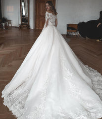 Elegant Long Sleeve Lace and Tulle Ball Gown Wedding Dress