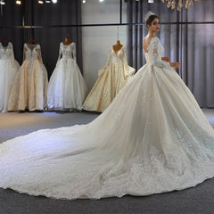 Elegant A-Line Sweetheart Wedding Dress with Long Sleeves, Lace Appliques & Sequins