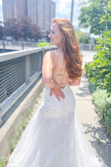 Elegant Open Back Mermaid Wedding Dress with Spaghetti Straps and Appliques