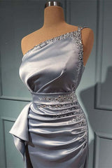 Elegant One-Shoulder Prom Gown: Shimmering Silver, Beaded Accents, Belted Waistline, Floor-Length