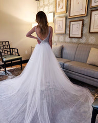 Elegant Sleeveless V-Neck Tulle Wedding Dress with Open Back and Chapel Train