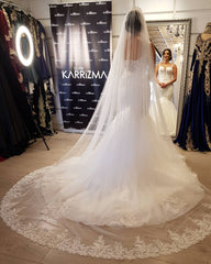 Elegant Lace Applique Mermaid Wedding Dress with Spaghetti Straps and Tulle