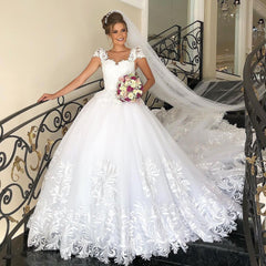 Elegant Princess Wedding Dress with Cap Sleeves, Tulle, and Delicate Lace Appliques