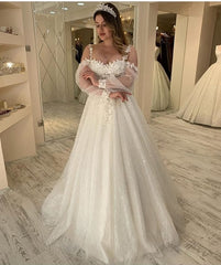 Elegant A-Line Wedding Dress with Spaghetti Straps and Long Sleeves