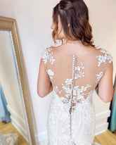 Elegant Ivory A-Line Wedding Dress V-Neck Lace and Tulle Gown