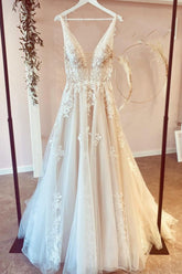 Elegant Deep V-Neck A-Line Tulle Wedding Gown with Delicate Floral Lace Appliques