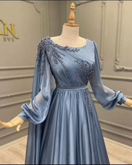 Elegant Blue Chiffon Evening Gown with Embellished Long Sleeves