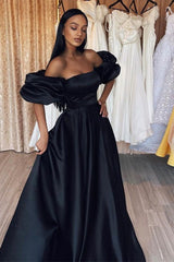 Elegant Black Mermaid Prom Dress with Bubble Sleeves and Strapless Design
