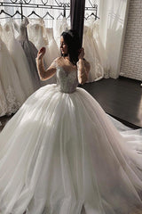 Shimmery Crystal Long Sleeve Ball Gown Wedding Dress with Beading Accents