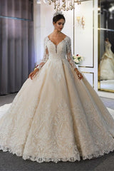 Elegant A-Line Sweetheart Wedding Dress with Long Sleeves, Lace Appliques & Sequins