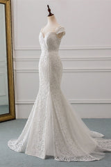 Elegant Sweetheart Lace Mermaid Wedding Gown with Cap Sleeves and Train