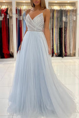 Dazzling Light Blue Tulle Prom Gown: Beaded Spaghetti Straps, Elegant Long Flowing Style