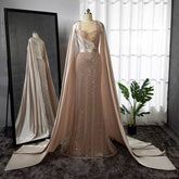 Elegant Pink Beaded Mermaid Evening Gown with Detachable Cape Sleeves