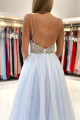 Dazzling Light Blue Tulle Prom Gown: Beaded Spaghetti Straps, Elegant Long Flowing Style