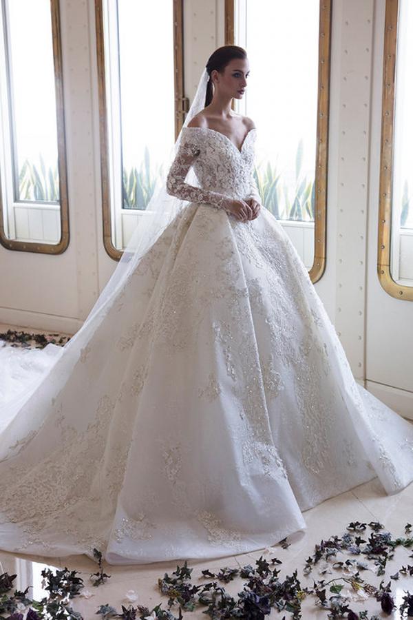 Elegant Off-Shoulder Sweetheart A-Line Wedding Gown with Long Sleeves, Lace, and Crystal Appliques