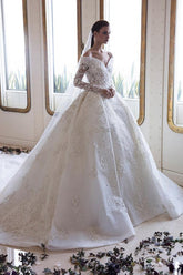 Elegant Off-Shoulder Sweetheart A-Line Wedding Gown with Long Sleeves, Lace, and Crystal Appliques
