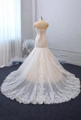 Elegant Sweetheart Backless Tulle Mermaid Wedding Gown with Delicate Lace Appliques