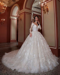 Elegant Bateau Long Sleeve Beaded A-Line Lace Wedding Gown with Chapel Train