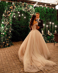 Elegant Off-Shoulder Tulle A-Line Wedding Dress with Chapel Train