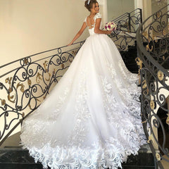 Elegant Princess Wedding Dress with Cap Sleeves, Tulle, and Delicate Lace Appliques