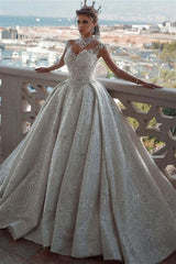Beaded Cap-Sleeve Ball Gown Wedding Dress with Tulle Appliqué