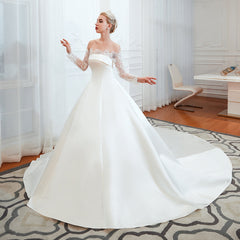 Elegant Off-Shoulder Long Sleeve A-Line Satin Wedding Gown with Delicate Lace