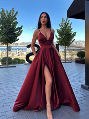 Elegant V-Neck Prom Dress with High Split, Pockets, and Flowing A-Line Skirt