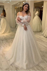 Elegant A-Line Wedding Dress with Spaghetti Straps and Long Sleeves