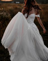 Elegant Off-Shoulder A-Line Tulle Wedding Dress with Delicate Lace Appliques