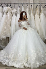 Elegant Off-Shoulder Long Sleeve Illusion Ball Gown Wedding Dress with Appliques
