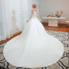 Elegant Off-Shoulder Long Sleeve A-Line Satin Wedding Gown with Delicate Lace