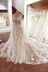 Elegant A-Line V-Neck Sleeveless Floral Lace Wedding Dress with Tulle and Boho Style