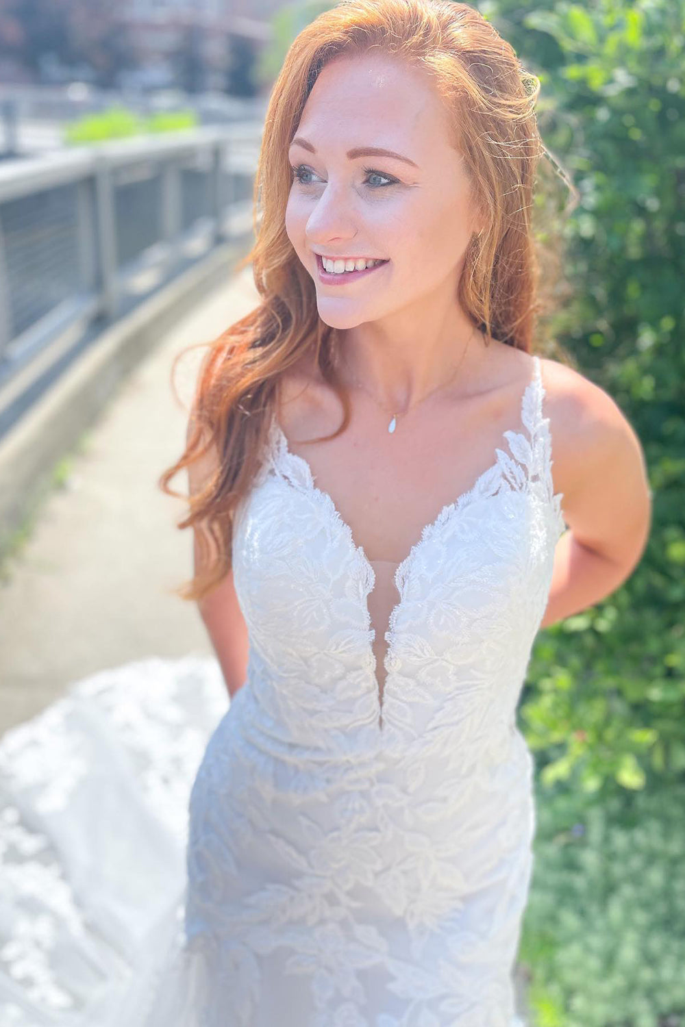 Elegant Open Back Mermaid Wedding Dress with Spaghetti Straps and Appliques