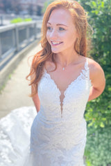 Elegant Open Back Mermaid Wedding Dress with Spaghetti Straps and Appliques