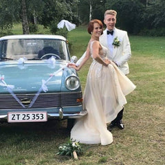 Elegant Off-the-Shoulder Lace Appliqued Tulle Ball Gown Wedding Dress