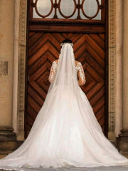 Elegant Mermaid Off-Shoulder Lace Wedding Gown with Long Sleeves and Watteau Train