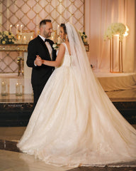 Elegant V-Neck Ball Gown Wedding Dress with Exquisite Lace Appliques