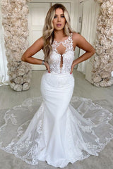 Elegant Spaghetti Strap Satin Backless Mermaid Wedding Dress with Exquisite Lace Appliques