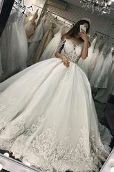 Sheer Tulle Ball Gown Wedding Dress with Appliques and Short Sleeves