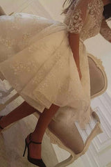 Elegant Short A-Line Wedding Dress with Jewel Neck, Sleeves, Tulle, and Lace