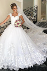 Elegant Princess Wedding Dress with Cap Sleeves, Tulle, and Delicate Lace Appliques