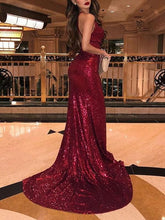 Elegant Sleeveless V-Neck Prom Dress with Ruffles and Sparkling Sequins