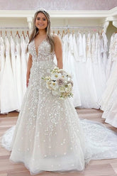 Luxury A-Line V-Neck Lace Wedding Dress with Appliques and Train