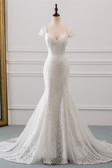 Elegant Sweetheart Lace Mermaid Wedding Gown with Cap Sleeves and Train