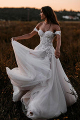 Elegant Off-Shoulder A-Line Tulle Wedding Dress with Delicate Lace Appliques