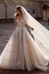 Elegant A-Line Sweetheart Backless Wedding Gown with Tulle and Floral Lace Details