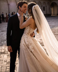 Elegant A-Line Sweetheart Backless Wedding Gown with Tulle and Floral Lace Details