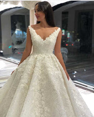 Elegant A-Line V-Neck Floor-Length Wedding Gown with Delicate Lace & Sequin Appliques