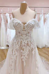 Elegant Off-Shoulder A-Line Wedding Gown with Sweetheart Backless Tulle and Train