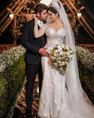 Elegant Off-Shoulder Long Sleeve Mermaid Wedding Gown with Exquisite Lace Appliques